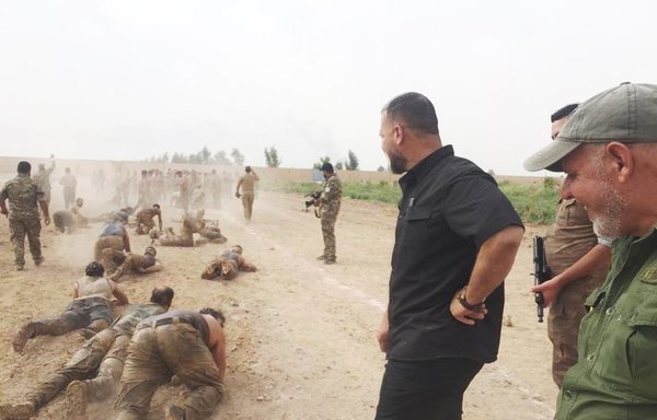 Iran-backed Iraqi militias are seen taking part in combat training in this photo, disseminated by the Imam Ali Brigades on October 11th, 2018.
