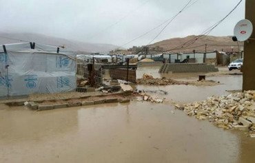 In Lebanon, Syrian refugees await winter aid