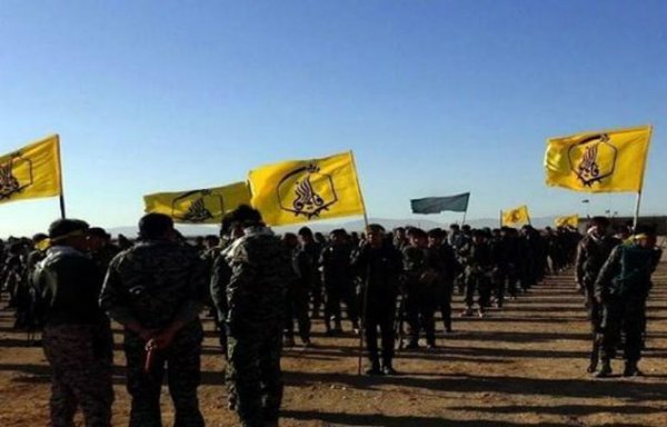 New US sanctions on Iran are expected to weaken the Fatemiyoun Division, pictured here, and other IRGC-affiliated militias, experts said. [Photo circulated on social media]