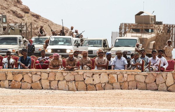 A picture taken on August 8th shows Yemeni soldiers attending a graduation of new police cadets in the south-eastern port city of al-Mukalla, the capital of Hadramaut, in the first such ceremony after the city was retaken from al-Qaeda extremists. [Karim Sahib/AFP]