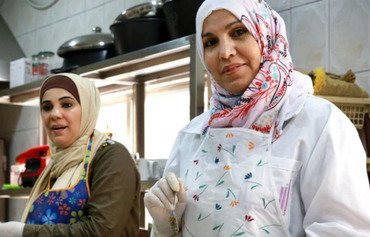 مشاريع تقديم الأطباق السورية تزدهر في الأردن