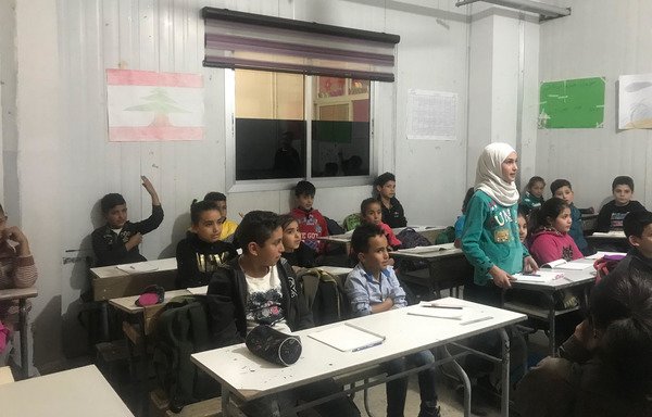 أطفال سوريون لاجئون يحضرون أحد الفصول الدراسية في إبتدائية بر الياس في منطقة البقاع. [نهاد طوباليان/المشارق]