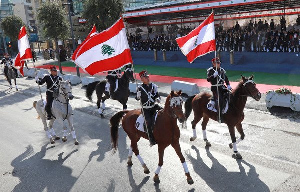 Members of the Lebanese forces take part in a military parade for Independence Day celebrations on November 22nd. [Anwar Amro/AA/AFP]