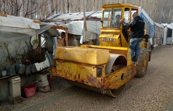 Sawa helped reinforce refugee tents with wood and plastic tarps ahead of a second snowstorm to hit Lebanon in less than two weeks. [Photo courtesy of Sawa]