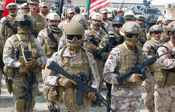 Soldiers from the US, Kuwait, and other Gulf Co-operation Council states participate in the Eagle Resolve military exercise at Kuwait's Shuwaikh Port on April 6th, 2017. The month-long drill included a series of tactical demonstrations of land, maritime and air forces. [Yasser al-Zayyat/AFP]