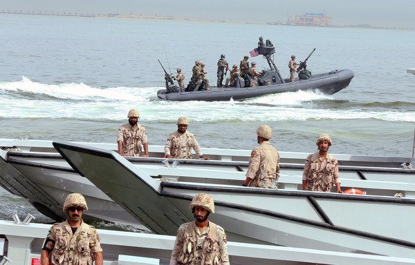 Soldiers from the US, Kuwait and other Gulf Co-operation Council states participate in the concluding drill of the Eagle Resolve military exercise at Kuwait's Shuwaikh Port on April 6th, 2017. [Yasser al-Zayyat/AFP]
