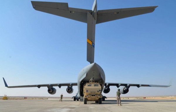 Members of the US Army's Task Force Spartan transfer military vehicles to Jordan. [Photo courtesy of Task Force Spartan website]