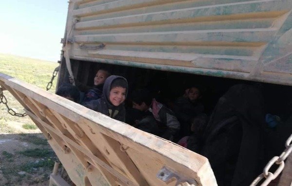Children exit the final ISIS enclave in Deir Ezzor's al-Baghouz village on February 22nd. ISIS has been using children and civilians as human shields against attacking forces. [Photo circulated on social media]