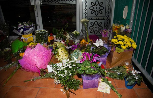 Flowers are placed on the front steps of the Wellington Masjid mosque in Kilbirnie in Wellington, New Zealand, on March 15th, after a shooting incident at two mosques in Christchurch left at least 49 dead the same day. [Marty Melville/AFP]