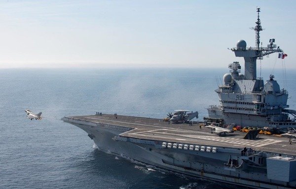 The French carrier Charles de Gaulle arrives off-shore Syria on March 13th to support coalition forces in the region. [USCENTCOM]