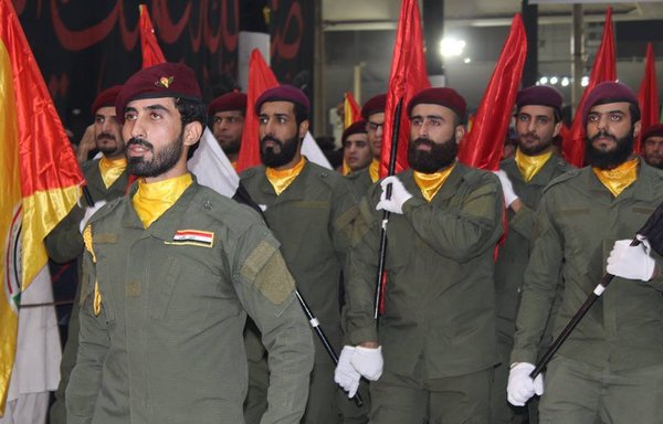 Members of the Iran-backed Kataib Sayyid al-Shuhada militia take part in a military parade in Iraq on November 19th, 2017. [Photo circulated by the militia's branch in Babil province]