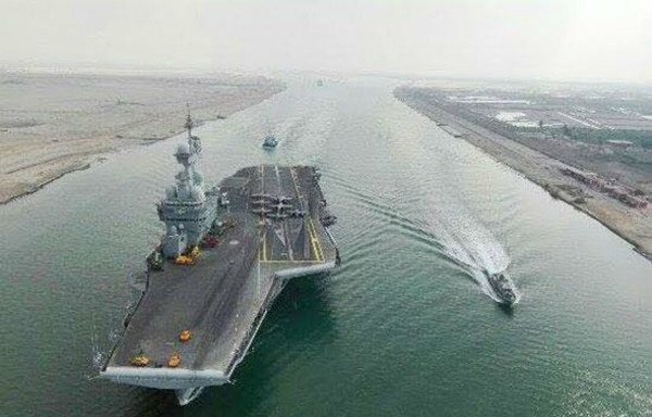 The French aircraft carrier Charles de Gaulle on its last crossing of the Suez Canal on March 3rd, 2016. The carrier is expected to cross the canal again in mid-April as part of a new deployment in the region in the fight against ISIS. [Photo courtesy of the Suez Canal Authority]