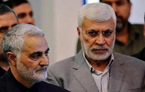 Abu Mahdi al-Muhandis (R), deputy head of the Popular Mobilisation Forces, is seen with IRGC Quds Force commander Maj. Gen. Qassem Soleimani. [Photo circulated on social media]