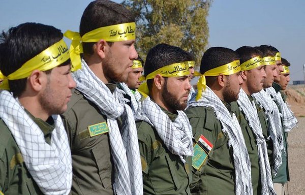 Members of an Iran-backed militia in Iraq are seen during a march. [Photo circulated on social media]