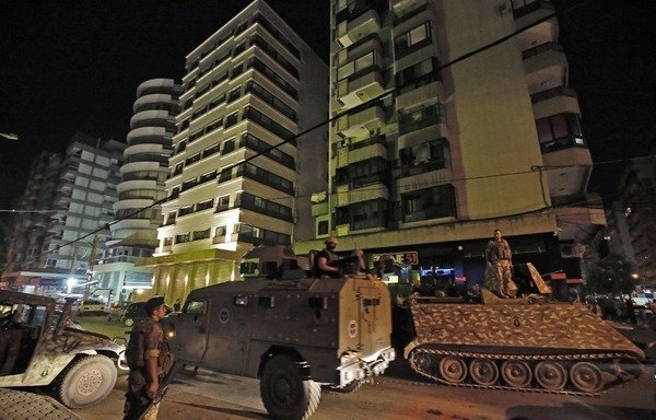 Lebanese troops are deployed in the northern port city of Tripoli after a militant attacked a security forces patrol and blew himself up when confronted on June 4th, on the eve of Eid el-Fitr. Two police officers and two army soldiers were killed in the attack. [Ibrahim Chalhoub/AFP]