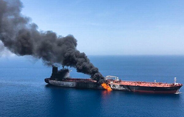A picture obtained by AFP from Iranian News Agency ISNA on June 13th, reportedly shows fire and smoke billowing from Norwegian-owned Front Altair tanker said to have been attacked in the waters of the Gulf of Oman. [ISNA/AFP]