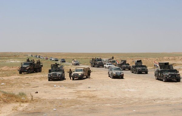 Iraqi military units deploy in the country's western desert on July 10th as part of the 'Will of Victory' security campaign. [Photo courtesy of the Iraqi Ministry of Defence]
