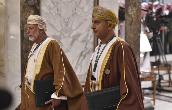 Oman's minister responsible for foreign affairs Yusuf bin Alawi (left) arrives at the Diriya Palace in the Saudi capital Riyadh during the Gulf Co-operation Council summit on December 9th, 2018. Bin Alawi will head to Iran July 27th to discuss the situation in the Gulf amid rising tensions. [Fayez Nureldine/AFP]