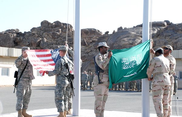 US and Saudi soldiers lower their country’s respective flags on February 28th to commemorate the success of Exercise Friendship Two. The exercise also gave both countries an opportunity to exchange ideas, learn new operational tactics and improve military relationships. [Photo courtesy of the US Army]