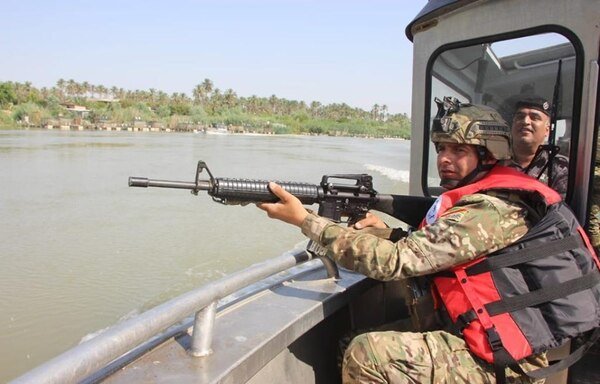 Iraqi soldiers search for ISIS remnants on the banks of the Tigris river north of Baghdad on July 22nd as part of the second phase of the 'Will of Victory' campaign. [Photo courtesy of the Baghdad Operations Command]