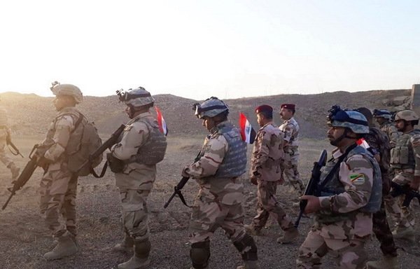 Iraqi soldiers from the army’s 5th Division are seen on August 6th during the 'Will of Victory' security campaign in Diyala. [Photo courtesy of the Iraqi Defence Ministry]