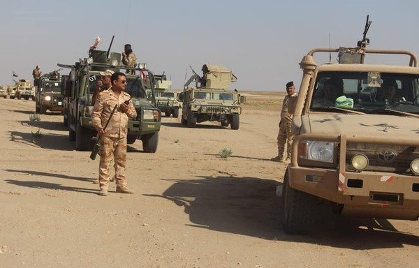Joint forces from the Iraqi army and local tribes are seen combing the desert in northern al-Qaim, near the Syria border on June 26th. [Photo courtesy of the Upper Euphrates Tribal Force]