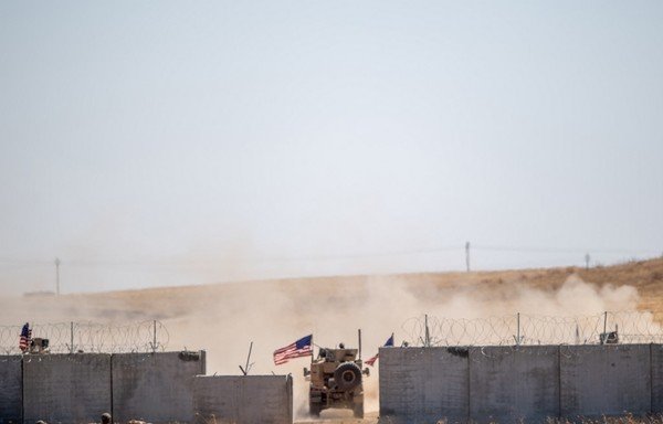 Turkish and US troops take part in their first joint patrol under a deal reached between Washington and Ankara at the border with Syria near Akcakale, in the Sanliurfa province of Turkey on September 8th, 2019. [Bulent Kilic/AFP]