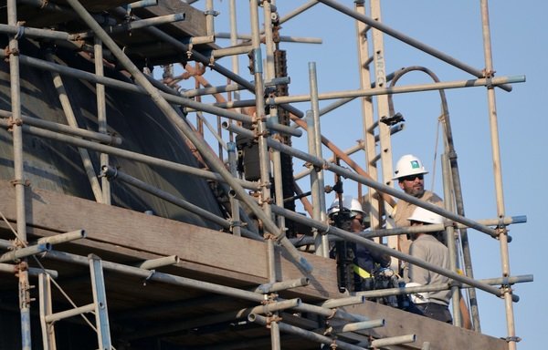 Aramco workers repair the oil facilities damaged in the September 14th drone attacks. [Photo courtesy of the Saudi Press Agency]