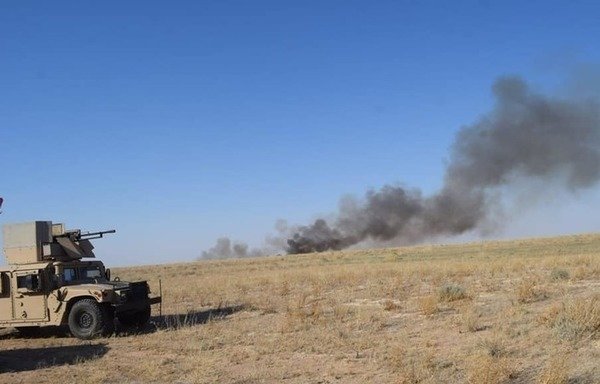 Iraqi forces strike an ISIS hideout in the Anbar desert as part of the first phase of the 'Will of Victory' security campaign on July 8th. [Photo courtesy of the Border Guard forces]