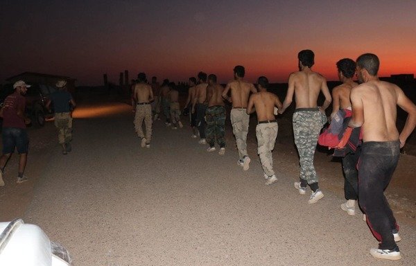 عناصر من جيش مغاوير الثورة خلال تدريب للمتطوعين الجدد. [جيش مغاوير الثورة/واتساب]