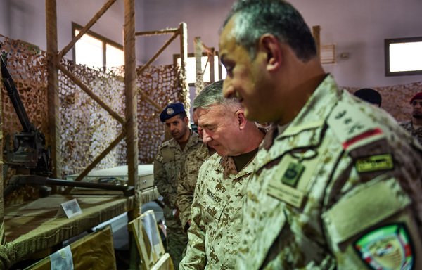 US Marine Corps Gen. and US CENTCOM commander Kenneth F. McKenzie Jr. and Arab coalition commander Lt. Gen. Fahd bin Turki bin Abdulaziz Al Saud are shown reportedly Iranian weapons seized from the Houthis by Saudi forces at a military base in the kingdom on July 18th. McKenzie pledged to work 'aggressively' to ensure maritime safety in strategic Gulf waters after a spate of attacks blamed on Iran. [Fayez Nureldine/AFP]