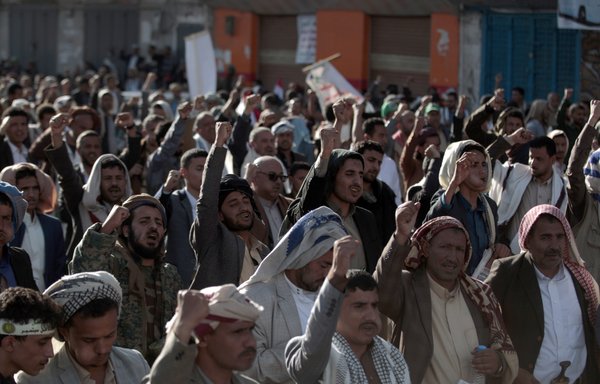 Supporters of the Iran-backed Houthis take part in a rally to commemorate the fifth anniversary of the Houthi takeover of Sanaa on September 21st. [Mohammed Huwais/AFP]