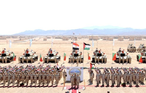 Egyptian and Jordanian forces stand at attention at the opening ceremony of the Aqaba-5 military drill. [Photo courtesy of the Egyptian Ministry of Defence Morale Affairs Department]