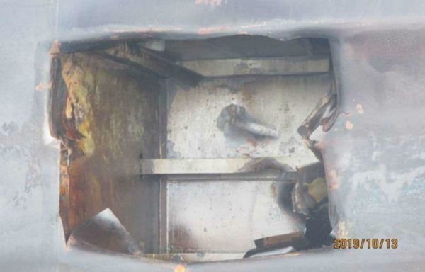 This photo circulated by the Iranian media shows what Iran claims is a hole in the Sabiti tanker caused by a missile, a claim disputed by experts. [Photo via Fars News]