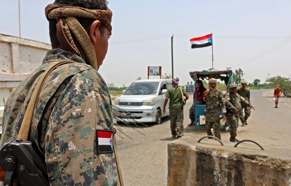 Fighters with the UAE-trained Security Belt Forces man a checkpoint near the Abyan province city of Zinjibar on August 21st. [Nabil Hasan/AFP]