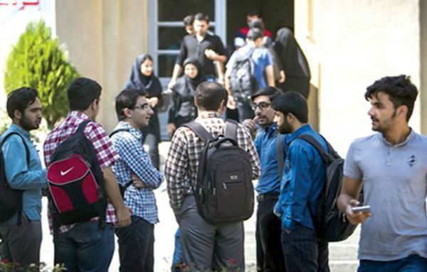 Iranian students are seen outside Tehran University. Youth in Iran face a close to 30% unemployment rate. [Photo via Mehr News]