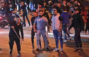 Lebanon protestors defiant despite Hizbullah attack