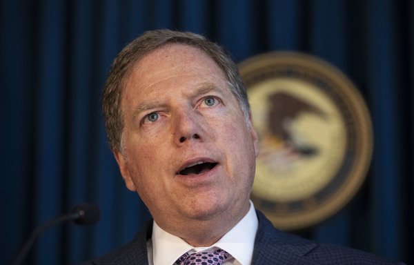 In this file photo taken October 10th, US Attorney for the Southern District of New York, Geoffrey Berman, speaks during a press conference. Ali Kourani, 34, an American of Lebanese descent, was sentenced to 40 years in prison on December 3rd for buying weapons and plotting attacks on behalf of Hizbullah. Berman said the lengthy sentence sent an important message to Hizbullah. [Drew Angerer/GETTY IMAGES NORTH AMERICA/AFP]