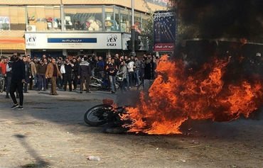 Iran's 'conspiracy' claims insult its people: analysts