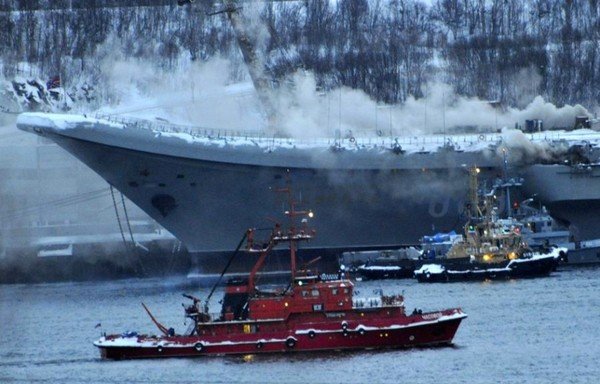 A major fire broke out on Russia's only aircraft carrier, the Admiral Kuznetsov, on December 12, highlighting growing concerns about the country's aging military hardware. [Lev Fedoseyev/TASS]