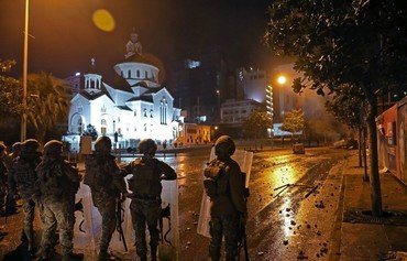 Dozens wounded as Hizbullah, Amal supporters clash with Lebanese police