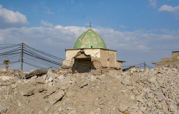 A picture taken on October 27th shows Mosul's heavily damaged al-Nuri Mosque in the former ISIS stronghold in northern Iraq, where the group's late leader Abu Bakr al-Baghdadi used to address followers before the group was chased out of the area in 2017. [Zaid al-Obeidi/ AFP]