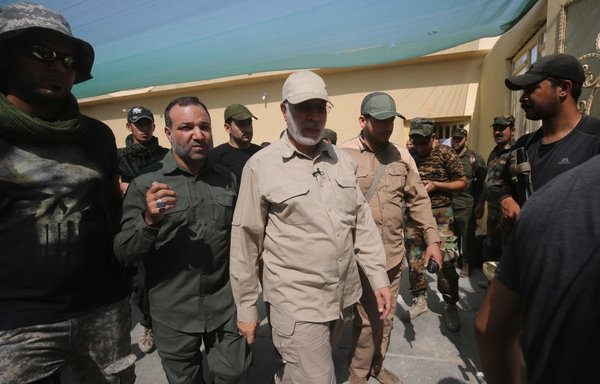 In this file photo taken on July 31st, 2016, PMF deputy head Abu Mahdi al-Muhandis visits the area of Khalidiya, east of Ramadi. [Ahmed al-Rubaye/AFP]