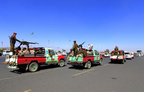Members of the Iran-backed Houthi military police parade in the streets of Sanaa on January 8th during 'martyrs' week'. [Mohammed Huwais/AFP]