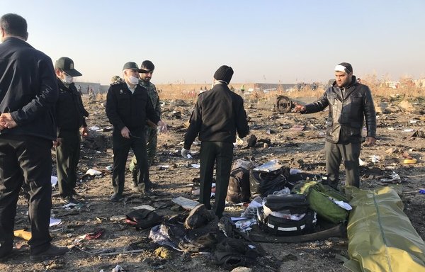 Iranian forces are seen at the crash site after a Ukrainian airliner was shot down by an Iranian missile on January 8th, killing all 176 on board. [Photo via Fars News Agency]