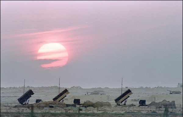 Three batteries of US-made Patriot missiles are seen in the Saudi Arabian desert in this file photo from January 1991. [Robert Sullivan/AFP]
