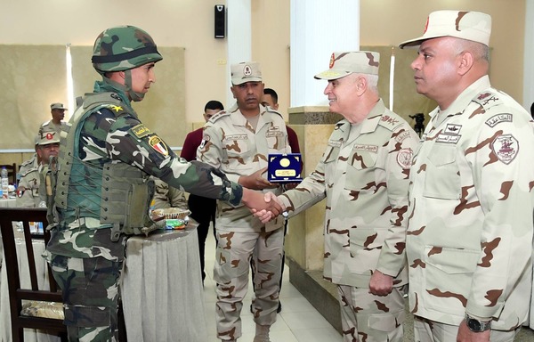 Chief of Staff of the Egyptian Armed Forces Lt. Gen. Mohammed Farid greets one of the officers who are taking part in counter-terrorism operations during a Saturday (February 8th) visit to North Sinai. [Photo courtesy of Egypt's Ministry of Defence]