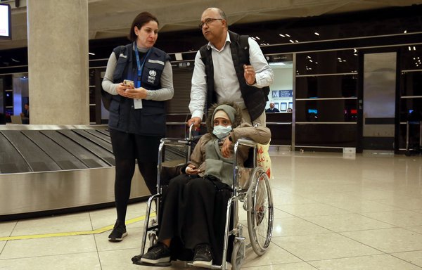 A Yemeni girl arrives at Queen Alia International Airport, south of the Jordanian capital Amman, following a second UN medical evacuation from Sanaa on February 8th. [Khalil Mazraawi/AFP]
