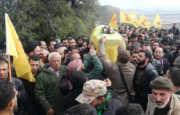 Mourners attend the funeral of Hizbullah fighter Abbas Jaafar in the Hermel area of eastern Lebanon. Several Hizbullah fighters were killed in the recent fighting in Syria's Idlib and Aleppo provinces. [Photo courtesy of Lebanon's National News Agency]