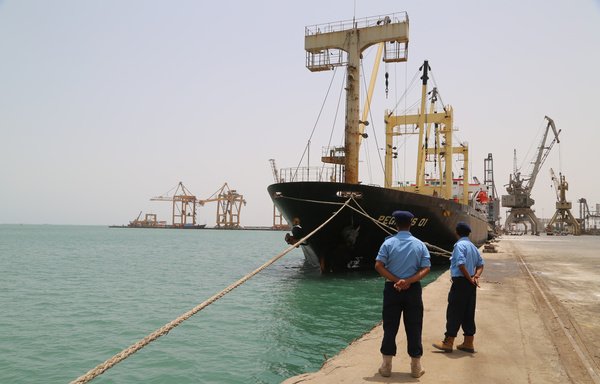 Yemeni coast guards look on at Saleef port on the Red Sea in al-Hodeidah province following the withdrawal of the Houthis on May 13th, 2019. [AFP]